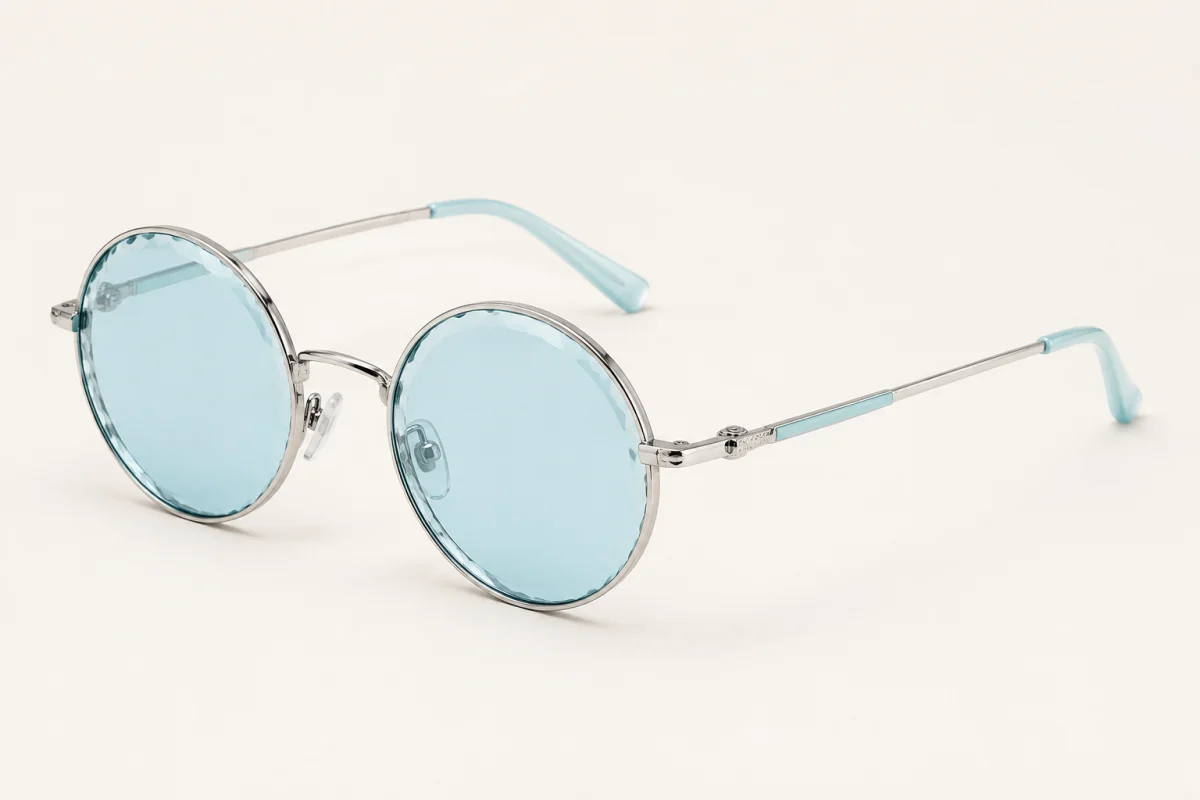 Round silver-tone Tiffany sunglasses with pale blue lenses and temple accents in a three-quarter product view